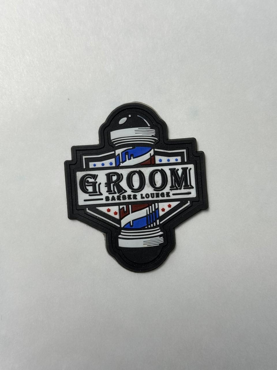 Embroidered barbershop patch detail